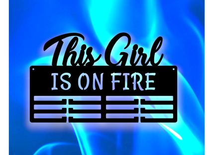 this girl is on fire metal wall hanger to display ribbons and medals